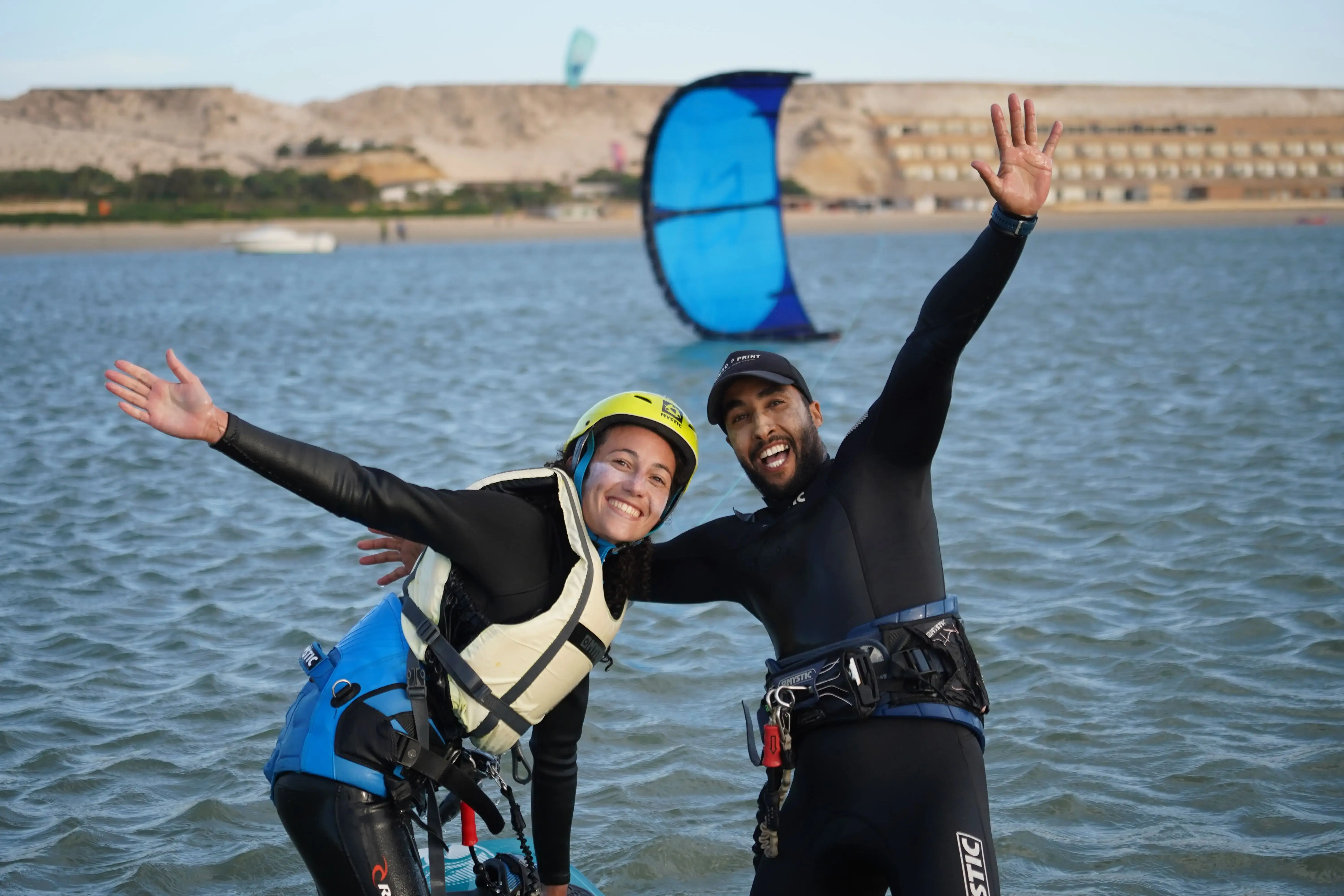 Kitesurfing instructor with student on the beach in Morocco